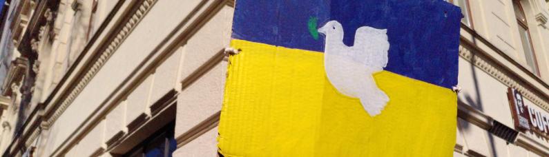 Friedenstaube auf ukrainischer Flagge
